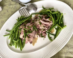 This roasted lamb with lemon, garlic, and olive oil is tender, flavorful, and easy to make—perfect for holidays or special family dinners.