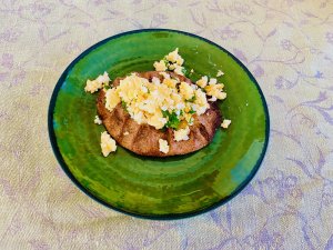 Karelian pie topped with Finnish egg butter (munavoi)