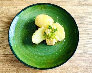 New potatoes topped with Finnish egg butter and dill
