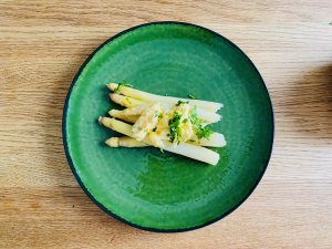 White asparagus topped with Finnish egg butter and chopped parsley