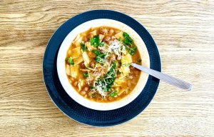 Pasta and bean soup with borlotti beans, tomatoes, pancetta, parsley, and Parmesan
