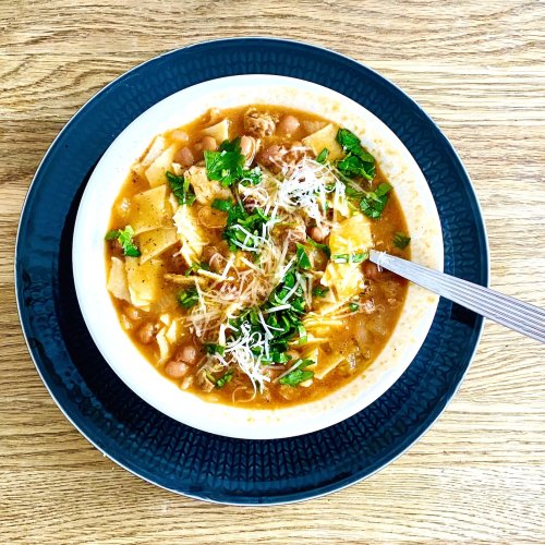 Pasta and bean stew with borlotti beans, tomatoes, pancetta, parsley, and Parmesan